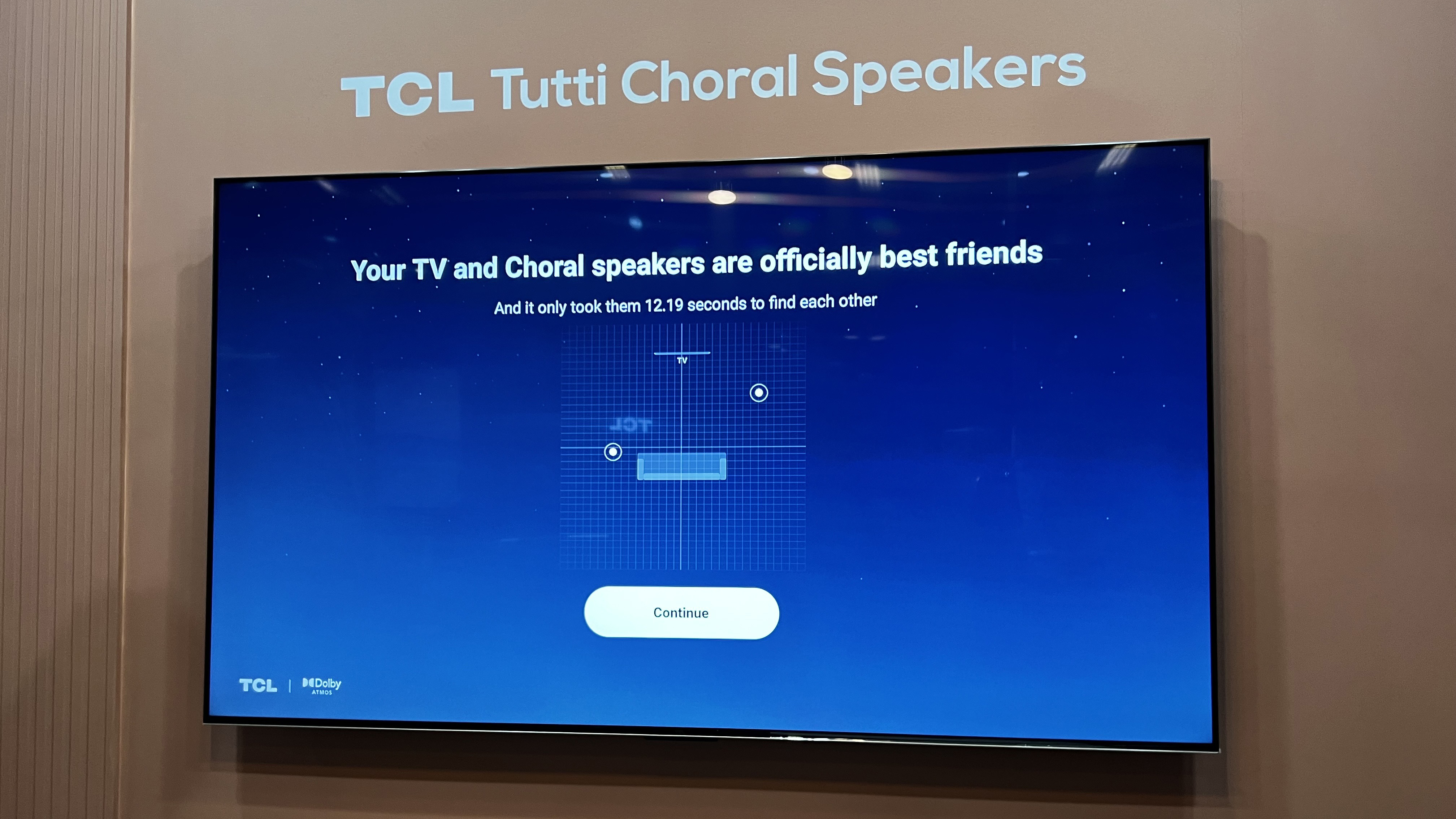 A TV showing a screen for Dolby Atmos' FlexConnect's calibration mode, indicating that's detected the location of two speakers