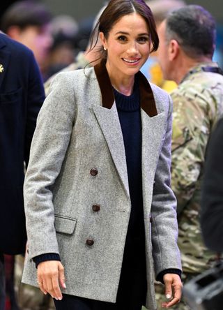 Meghan Markle wearing a grey blazer