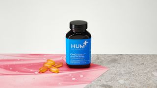 HUM Nutrition OMG! Omega the Great Supplement container and capsules on a table