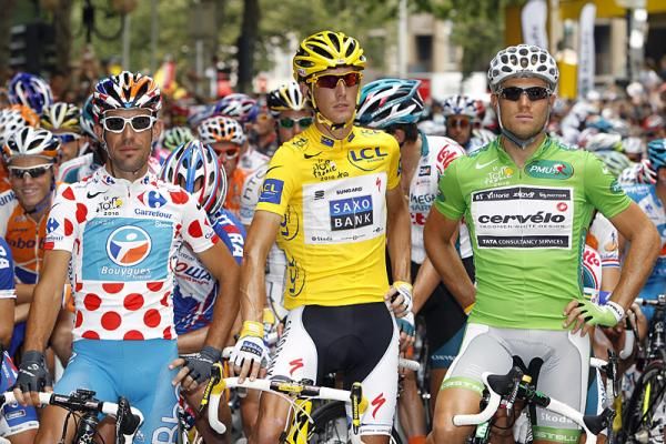 The Tour's jersey holders await the start of stage 10 (l-r): Anthony Charteau, Andy Schleck and Thor Hushovd.