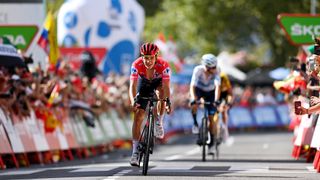 Remco Evenepoel wears the red leader's jersey at the 2022 Vuelta a España