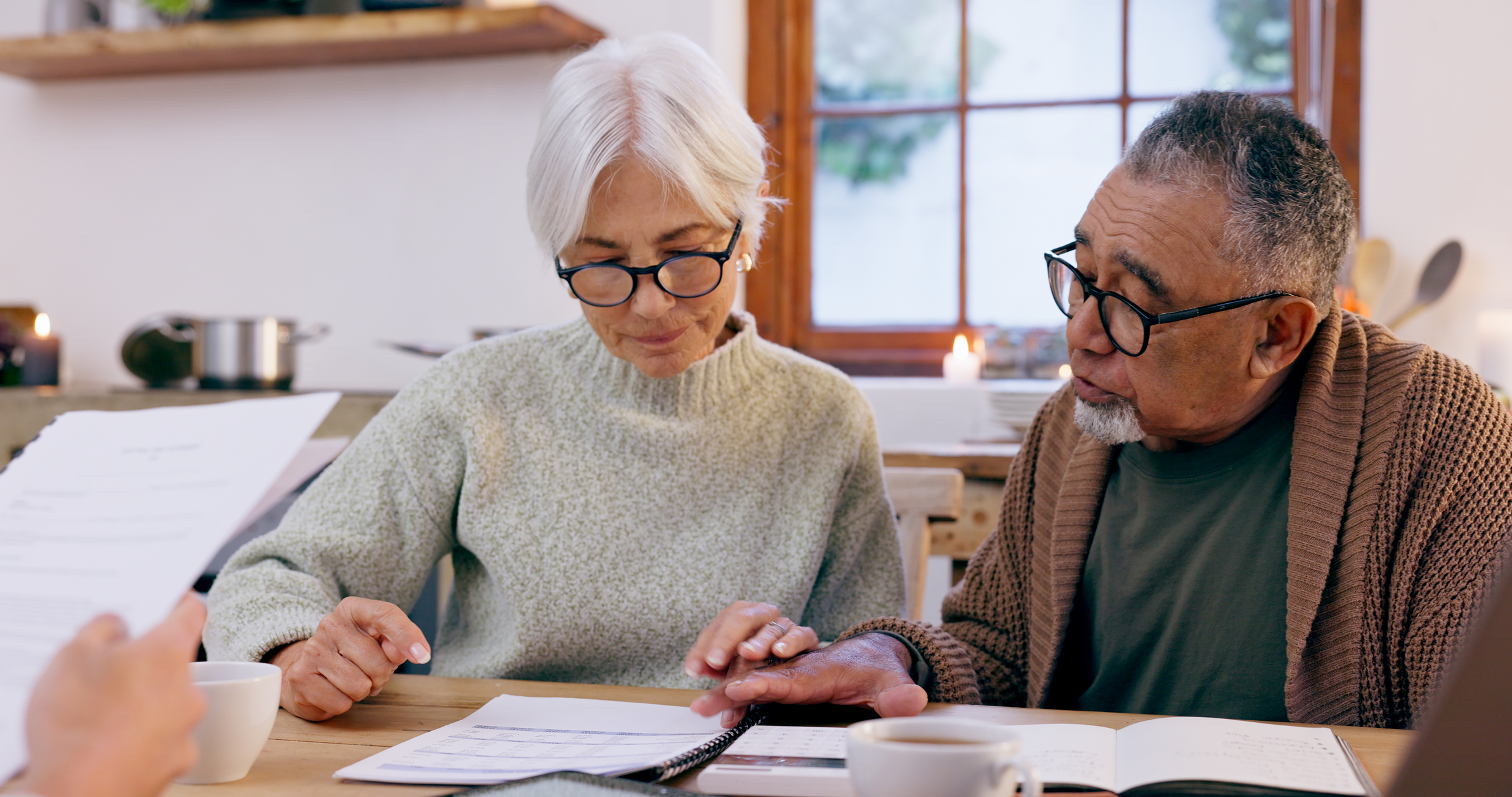 Older couple going over financial documents
