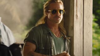 Brad Pitt eating in The Lost City