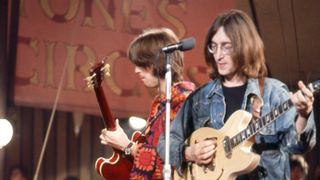 Eric Clapton, the English rock and blues guitarist, singer, and songwriter, and John Lennon (1940-1980), the English singer, songwriter, peace activist and co-lead vocalist and rhythm guitarist of the Beatles, perform as part of The Dirty Mac during the Rolling Stones' "Rock and Roll Circus" at Intertel Studio in Wembley, England, February December 11, 1968