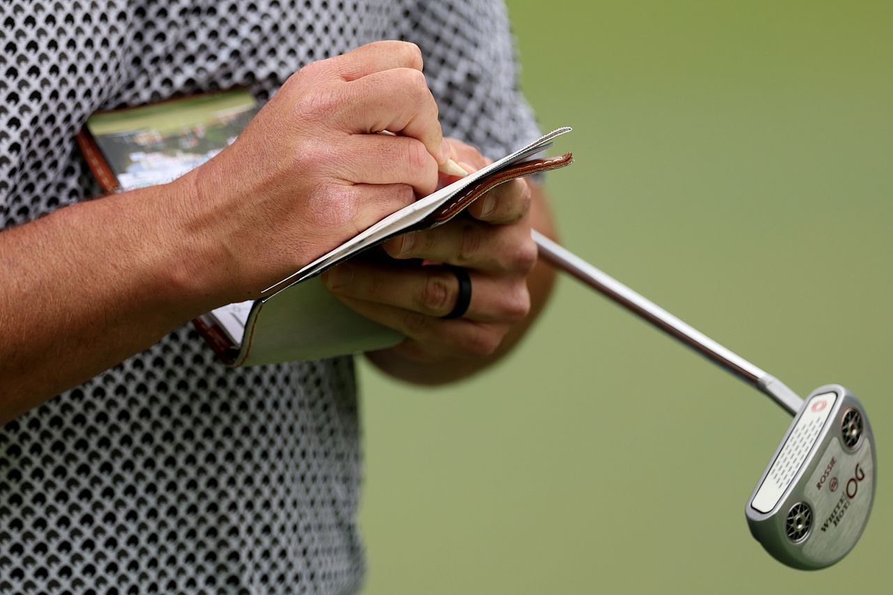A close-up of Jon Rahm's putter