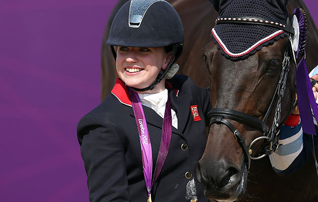 LONDON, ENGLAND - SEPTEMBER 03: Natasha Baker of Great Britain with Cabral wins gold in the Dressage Individual Freestyle Test, Grade II in the Equestrain on day 5 of the London 2012 Paralympic Games at Greenwich Park on September 3, 2012 in London, England. (Photo by Julian Finney/Getty Images)