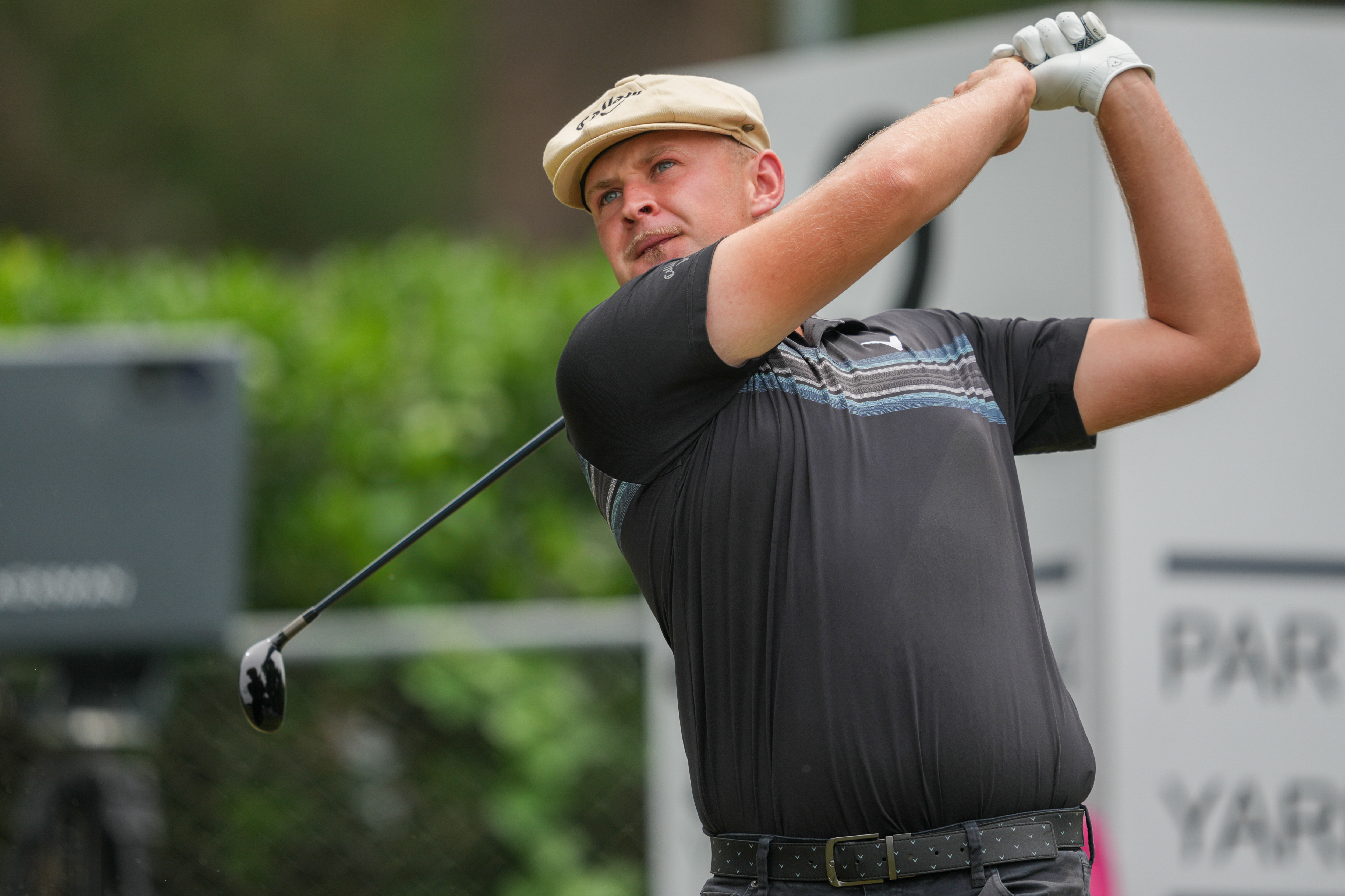 Harry Hall of England tees off on hole #2 during Round Three of the Charles Schwab Challenge at Colonial Country Club