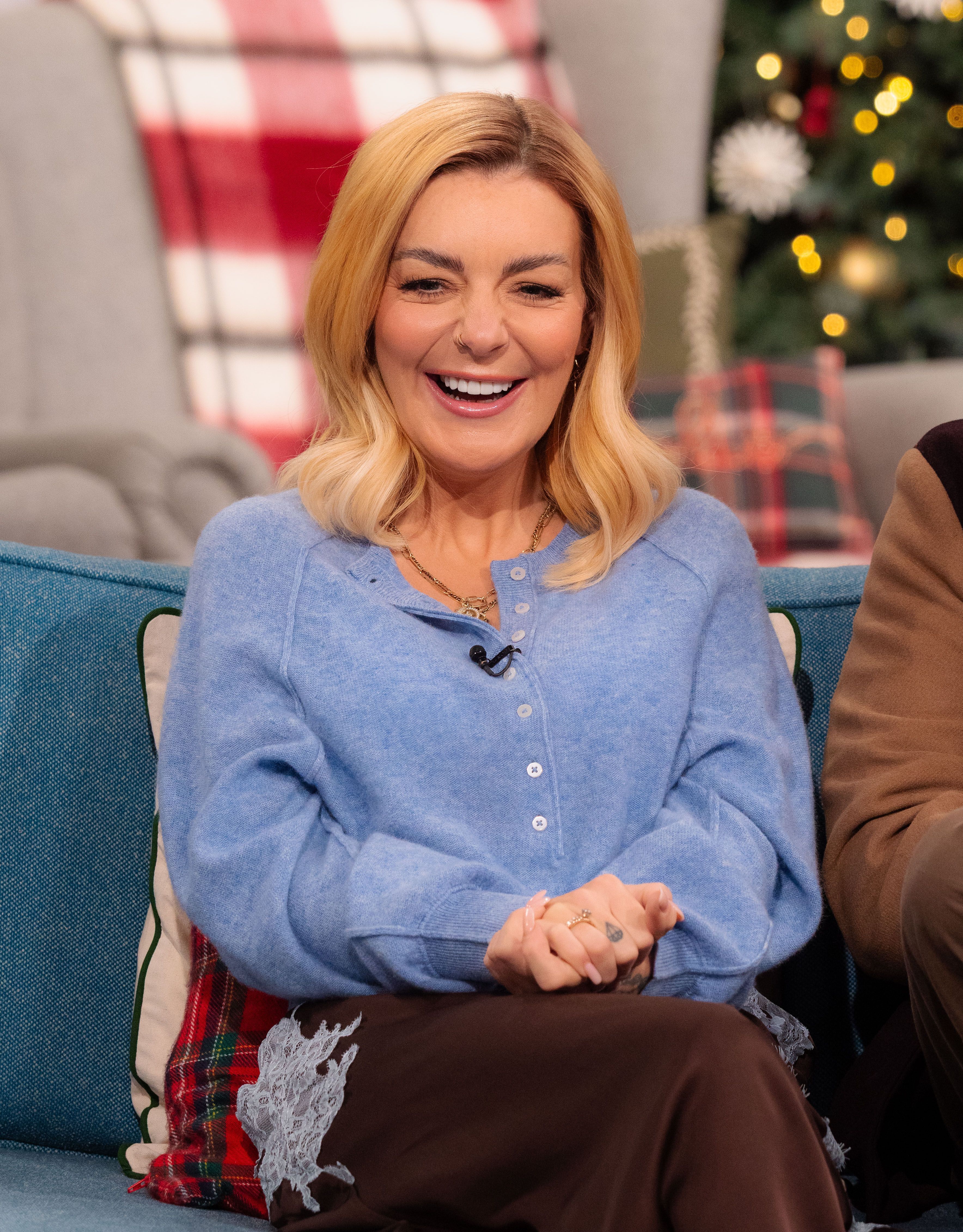 Sheridan Smith wearing blue cardigan and brown satin maxi skirt on This Morning, 04 December 2025
