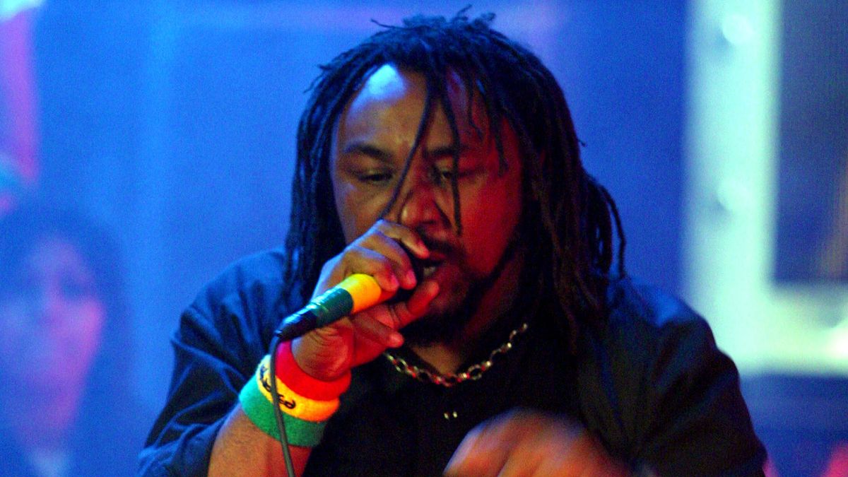 Benji Webbe of Skindred performing live in 2004