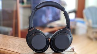Hero image for best Alexa headphones showing Sony WH-1000XM4