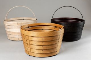 Three wooden baskets made of steam bent wooden rings
