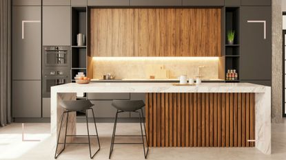 Contemporary Japandi style kitchen with wood paneling and warm lights to avoid key kitchen design mistakes