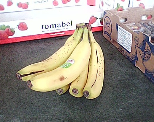 Low-res photo of some bananas