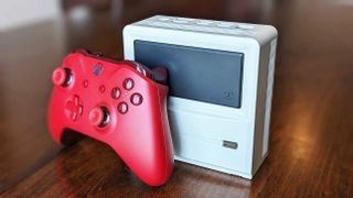 AYANEO Retro Mini PC AM01 with Xbox controller.