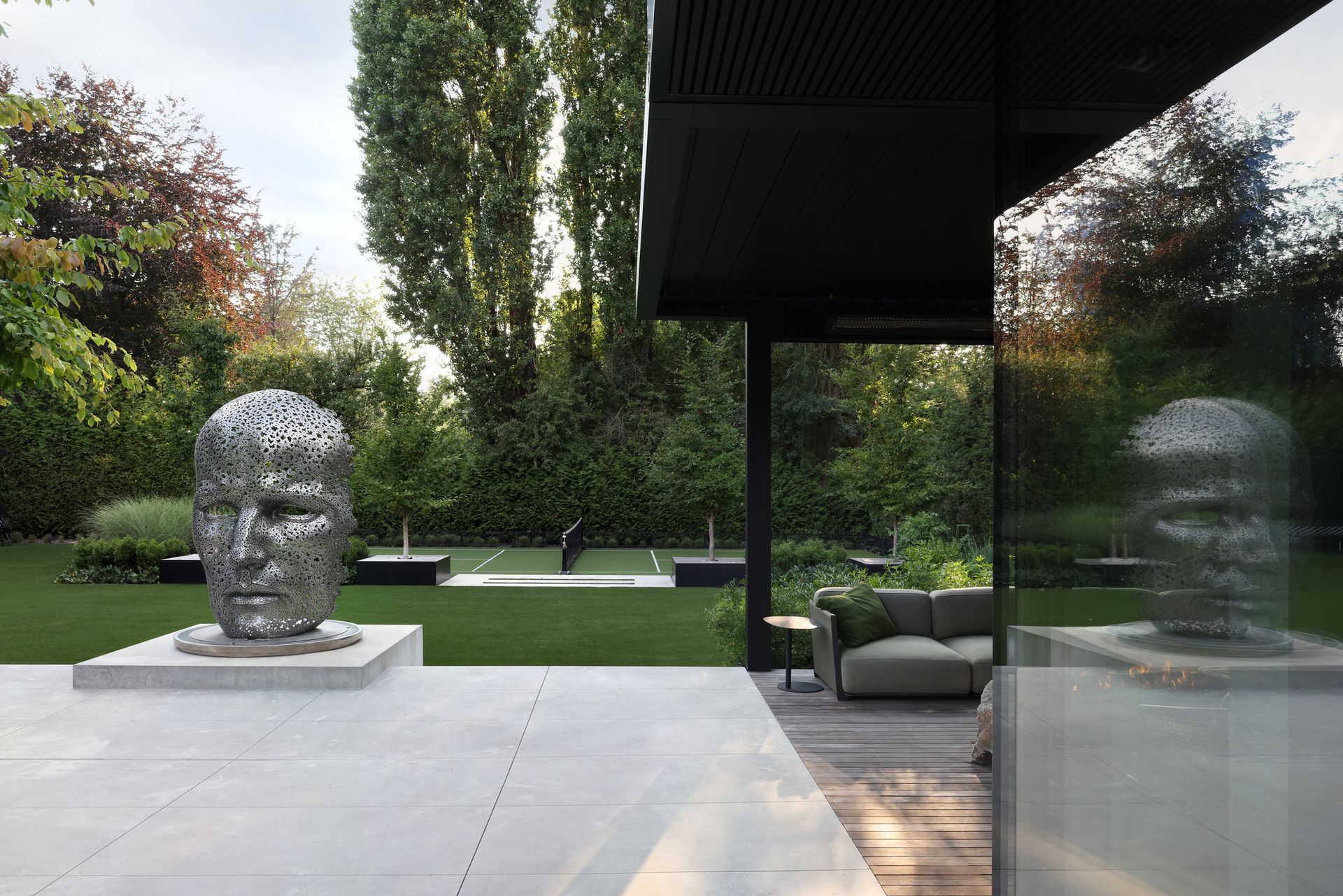 A pickleball court in the background of the gardens