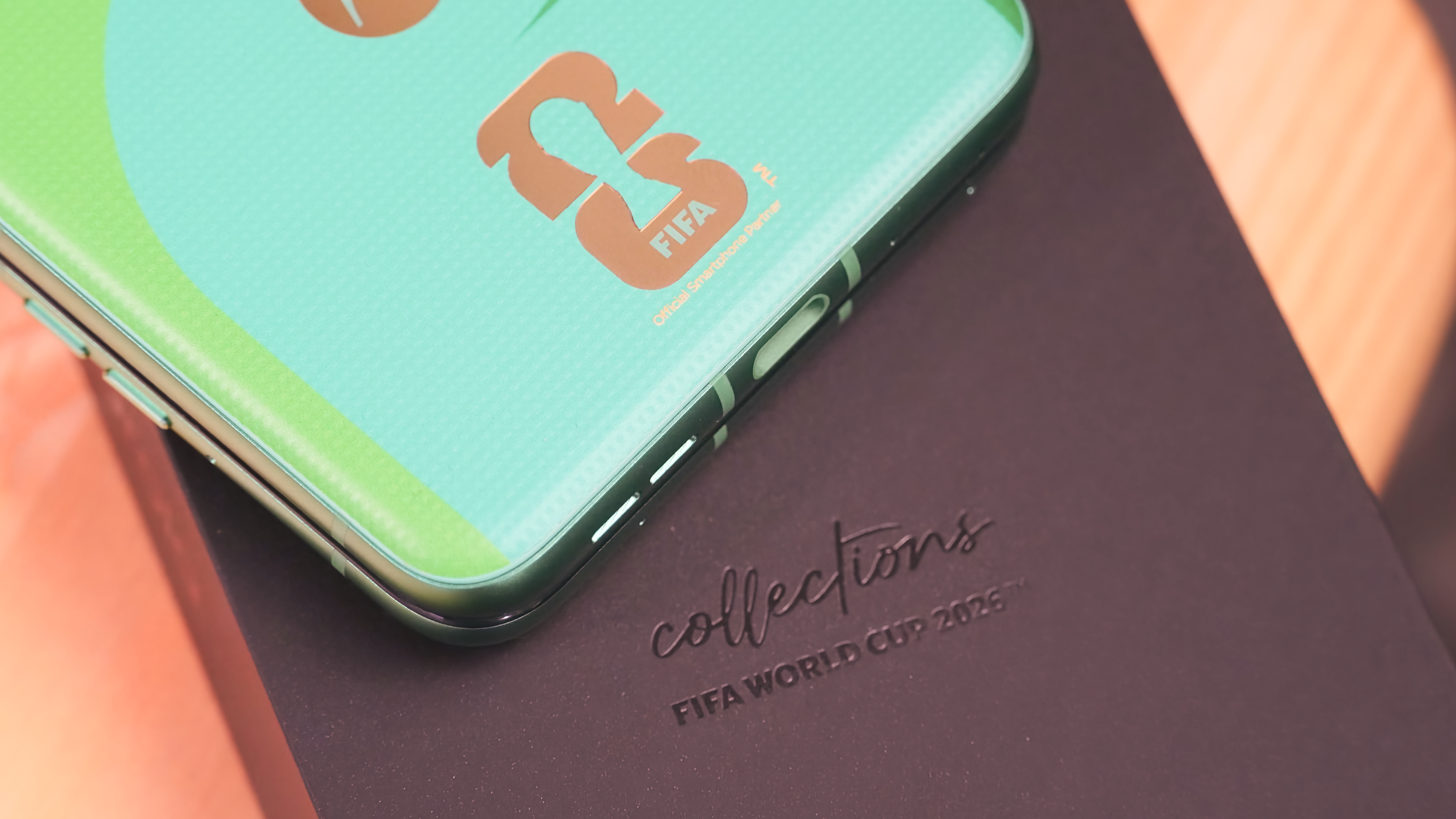 The FIFA World Cup 26 Edition of the Motorola Razr 2025 in the Pantone Spring Bud exclusive colorway.