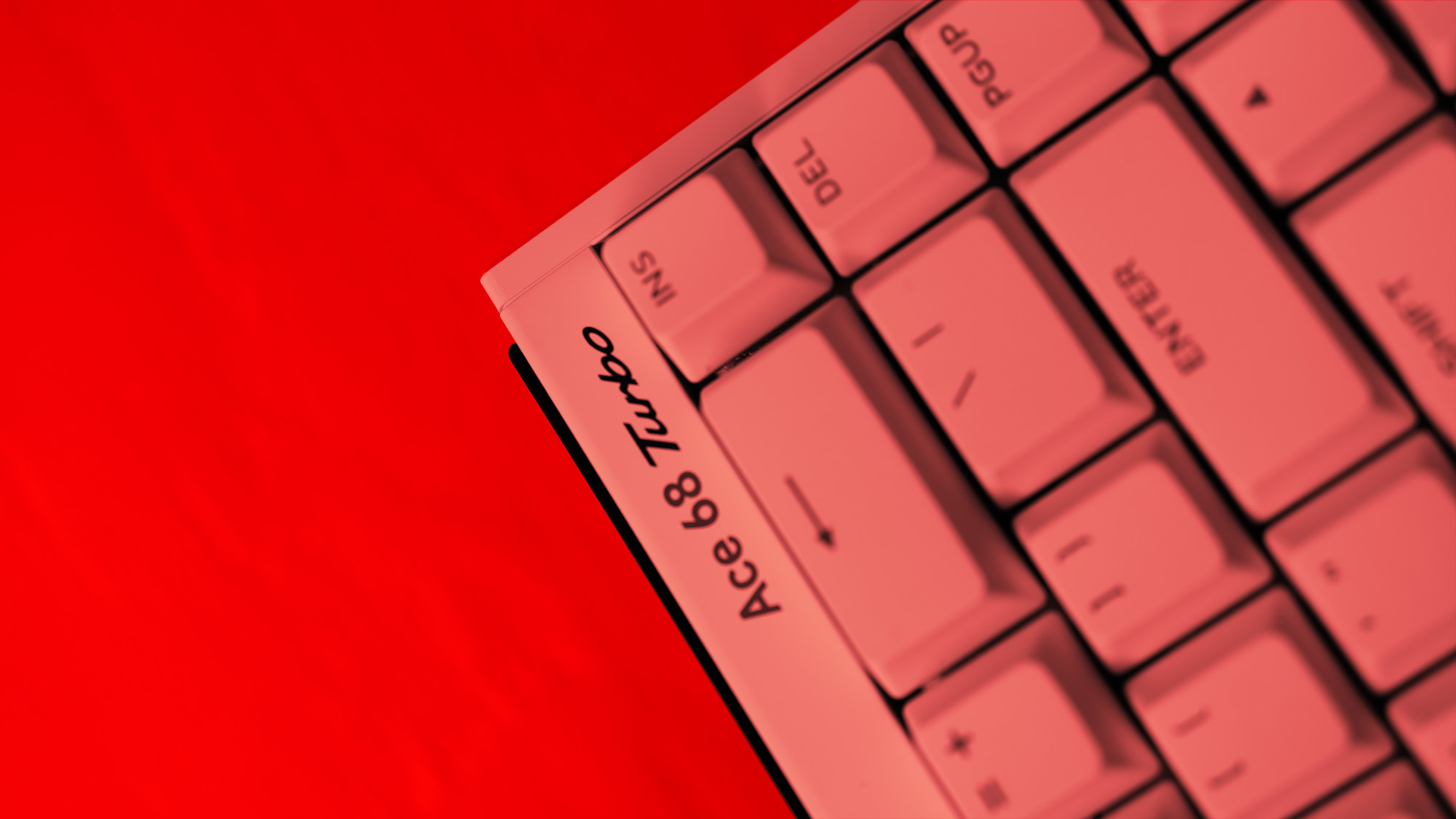 The Mchose Ace 68 Turbo on a red background.