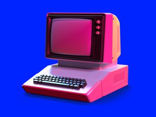 An old style computer in pink 