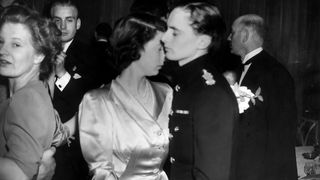 Princess Elizabeth dancing with Captain Lord Rupert Nevill at The Royal Merchant Navy Ball, in aid of King George's Fund for Sailors at The Dorchester Hotel in Park Lane. May 1946.
