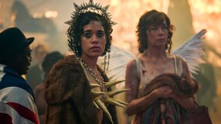 Billie Cassidy (Uni Meyers) and Kate Galloway (Julianne Nicholson) stand wearily in their soiled club costumes as London celebrates the end of World War 1 in a crowded Trafalgar Square in historical drama Dope Girls.