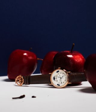 Breguet watch beside apples