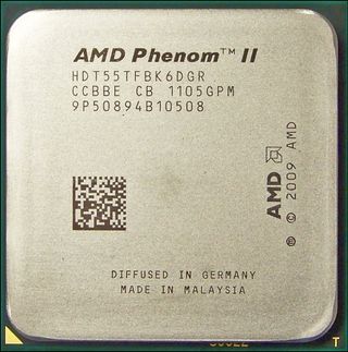 The Phenom II X6 conceals six cores and memory controllers for both DDR2 and DDR3 memory beneath its protective metal spreader plate.