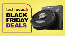 Shark robot vacuum on a yellow background with TechRadar Black Friday deals graphic overlaid