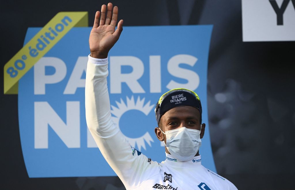 IntermarcheWantyGobert Materiauxs Eritrean rider Biniam Girmay Hailu celebrates his white jersey of best young on the podium at the end of the 1st stage of the 80th edition of the Paris Nice cycling race 160 km between ManteslaVille and ManteslaVille on March 6 2022 Photo by FRANCK FIFE AFP Photo by FRANCK FIFEAFP via Getty Images