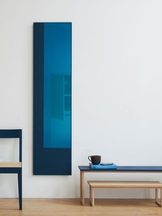 Blue stained wooden mirror