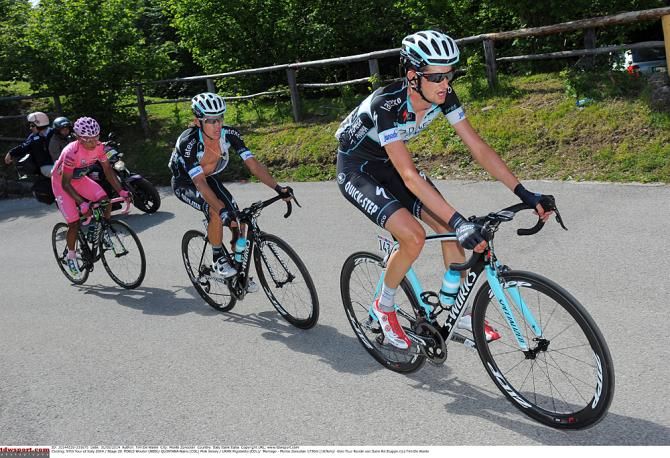 Wout Poels leads Omega Pharma teammate Rigoberto Uran, but race leader Nairo Quintana held fast to the group