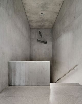 lower-ground concrete stairwell