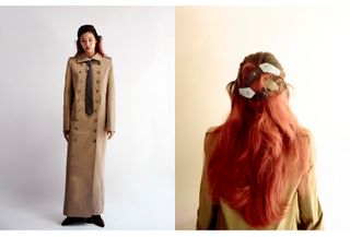 Model and actress Hoyeon wears a floor-length double-breasted trench jacket by Khaite styled with a Ernest W. Baker tie and Louis Vuitton hair clips.