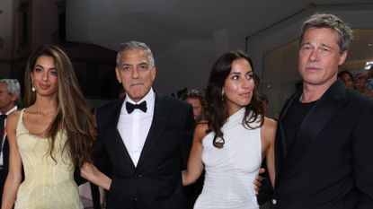 Amal Clooney, George Clooney, Brad Pitt, and Ines de Ramon attend the &quot;Wolfs&quot; red carpet at Venice Film Festival on September 01, 2024.