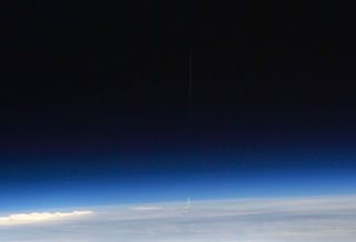 While keeping an eye on Cape Canaveral from the International Space Station, Russian cosmonaut Ivan Vagner captured this photo of SpaceX's Crew Dragon spacecraft emerging from Earth's upper atmosphere after launching to orbit on May 30, 2020.