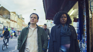 Josh (Joshua McGuire) and Fola (Susan Wokoma) walking down the street in Cheaters Season 2