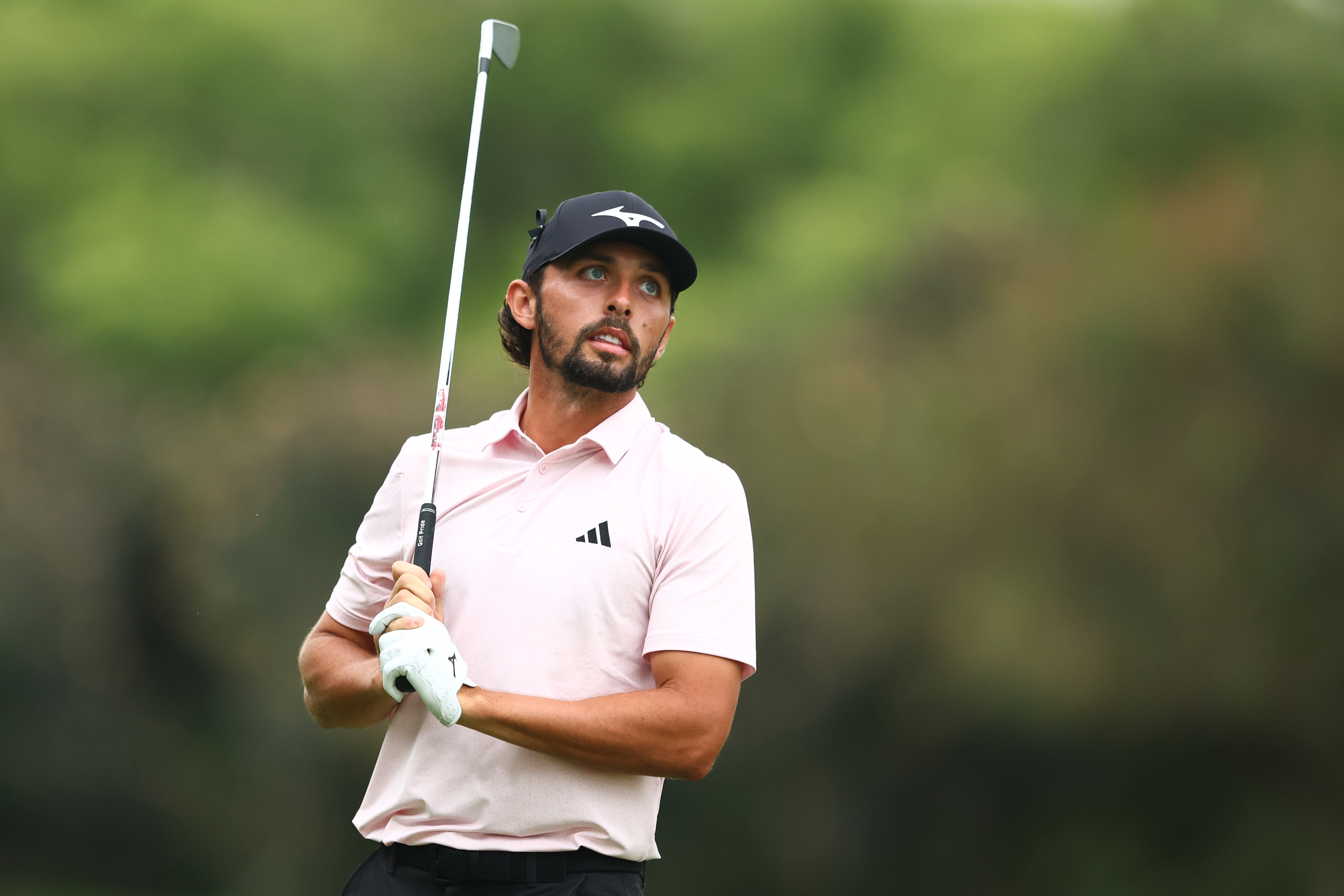 Marco Penge hits an iron shot