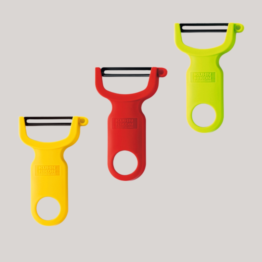 KUHN RIKON Original Swiss Peeler, Set of 3, Red/Green/Yellow against a pale grey background.
