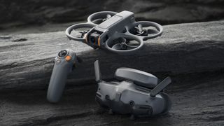 DJI Avata 2 FPV drone, DJI Goggles 3 and controller on gray rocks