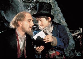 Jack Wild as The Artful Dodger with Ron Moody as Fagin in the 1968 movie Oliver!