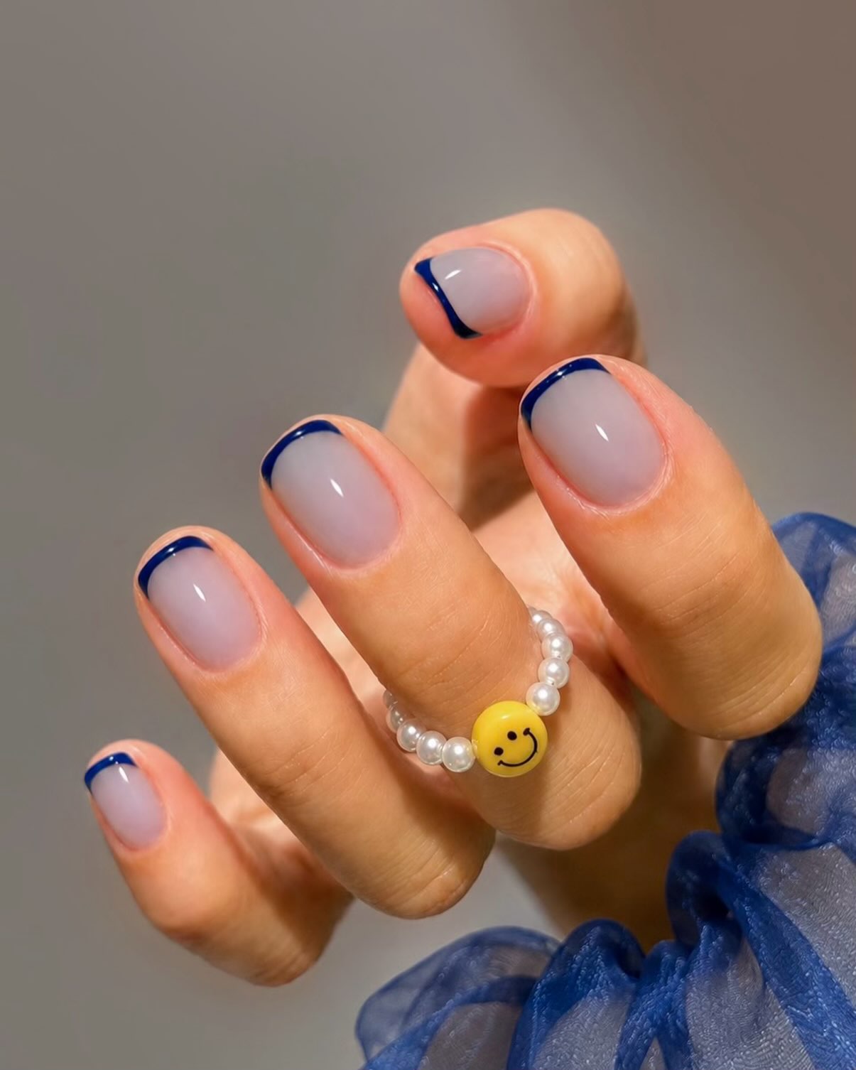 Navy French tips.