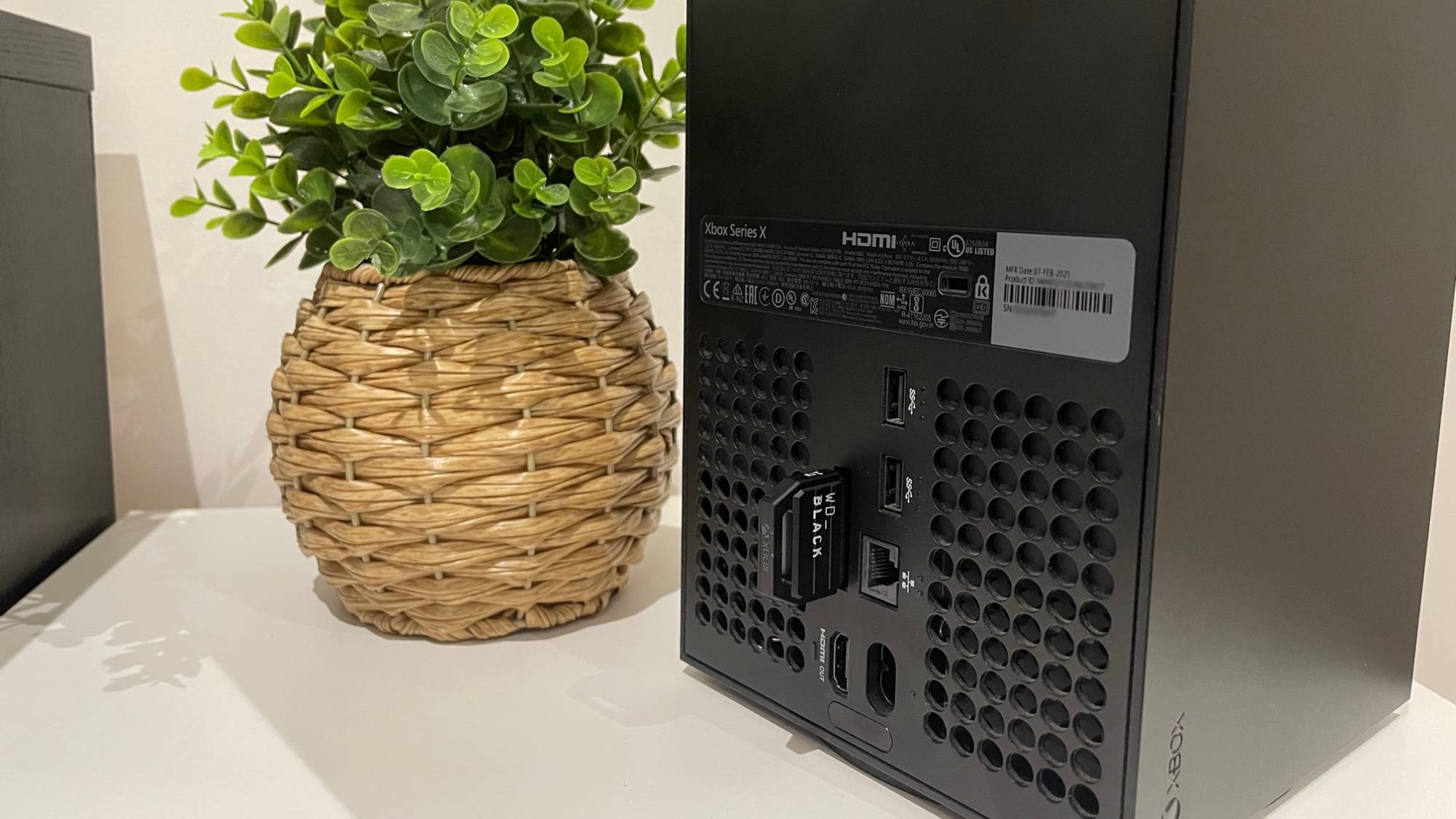 an xbox series x console with a WD_Black C50 expansion card