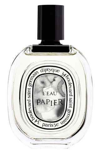 Diptyque L'eau Papier Eau De Toilette bottle on a white background