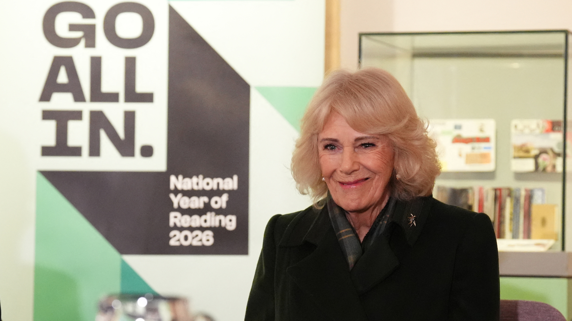Queen Camilla smiles during a visit to The National Library of Scotland in Edinburgh