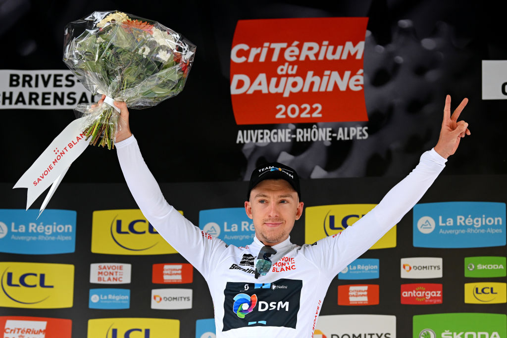 BRIVESCHARENSAC FRANCE JUNE 06 Kevin Vermaerke of United States and Team DSM celebrates winning the white best young jersey on the podium ceremony after the 74th Criterium du Dauphine 2022 Stage 2 a 1698km stage from SaintPray to BrivesCharensac WorldTour Dauphin on June 06 2022 in BrivesCharensac France Photo by Dario BelingheriGetty Images