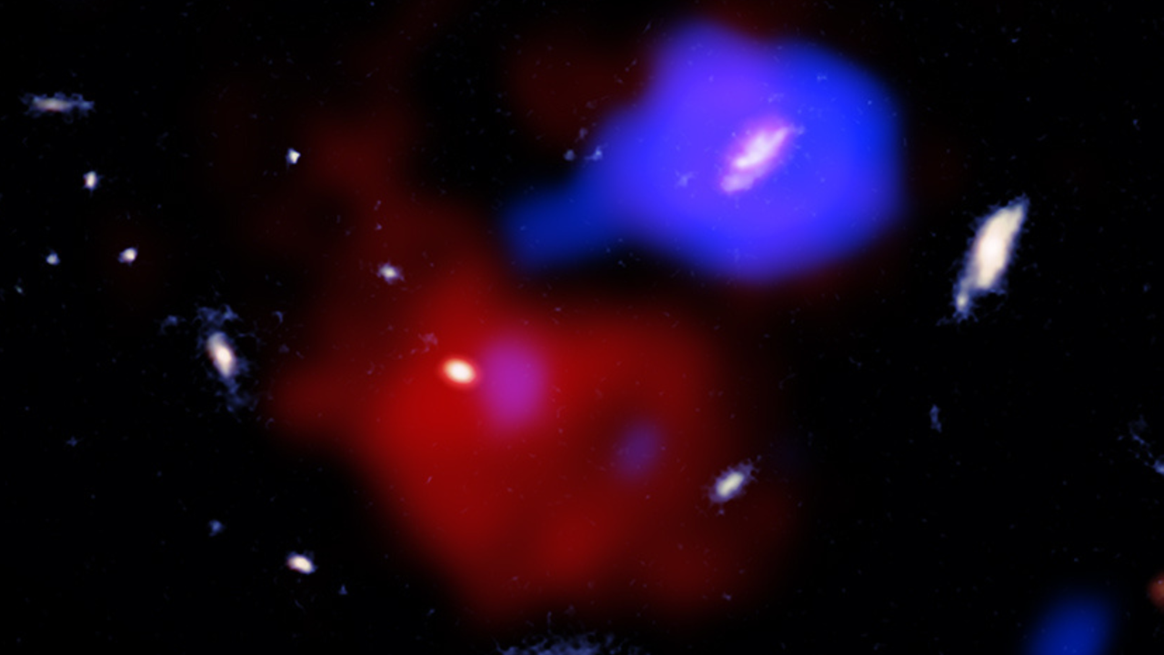 X-ray spacecraft finds supermassive black hole stirring up the 'red potato' galaxy: 'There may be a cook in this cosmic kitchen'