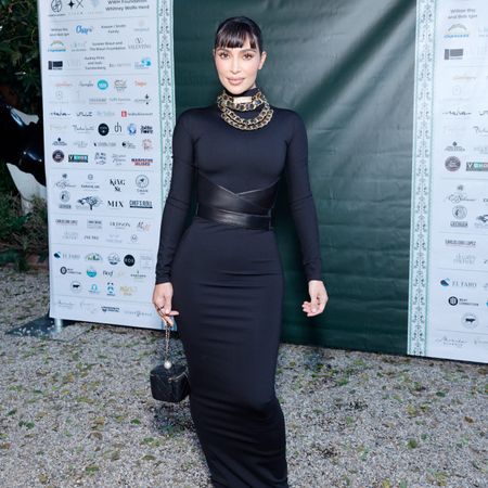Kim Kardashian debuts baby bangs at a charity event