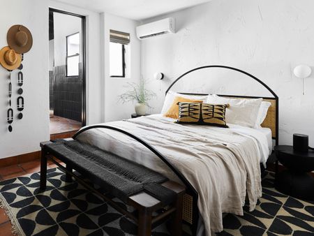 a rustic spanish style bedroom