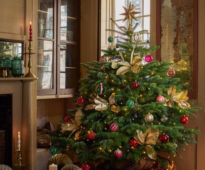 christmas tree with pink and gold baubles