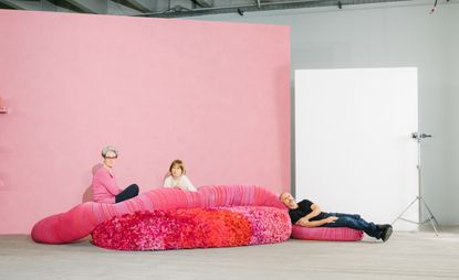 women sitting on recycled fabrics