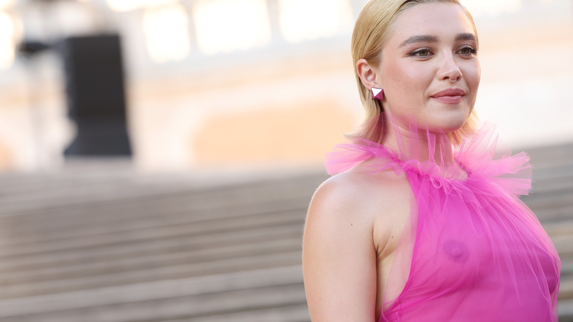 Florence Pugh hits back at body shamers for commenting on her 'small breasts 